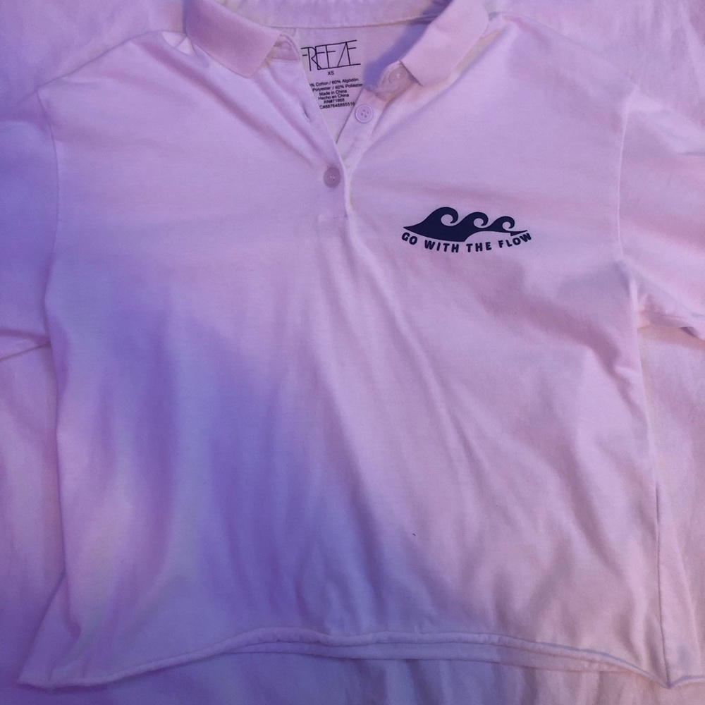 cropped white long sleeve with small design